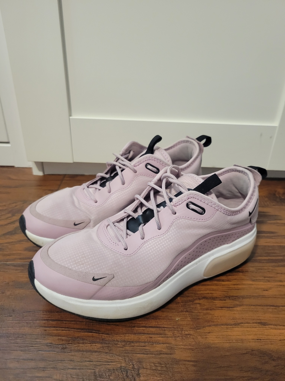 Nike Women’s Light Pink and Black Low-Top Sneakers